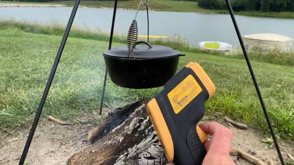 Infrared thermometer in front of a burning campfire.