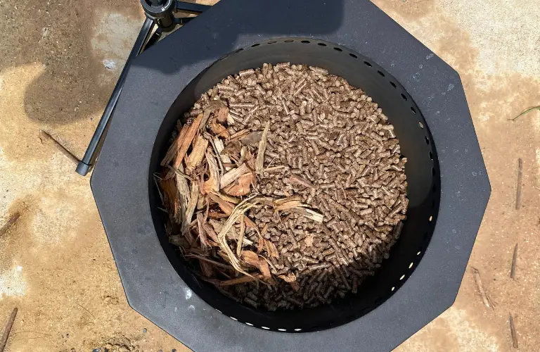 smokeless fire pit filled with 2" of pellets