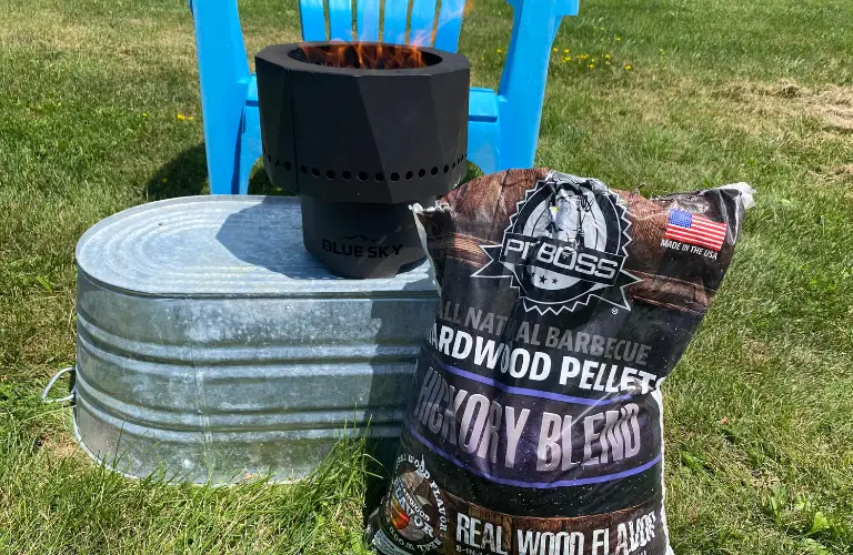 hardwood pellets next to blue sky pike ultra portable smokeless fire pit