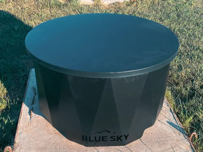 a fire pit with a cover on it